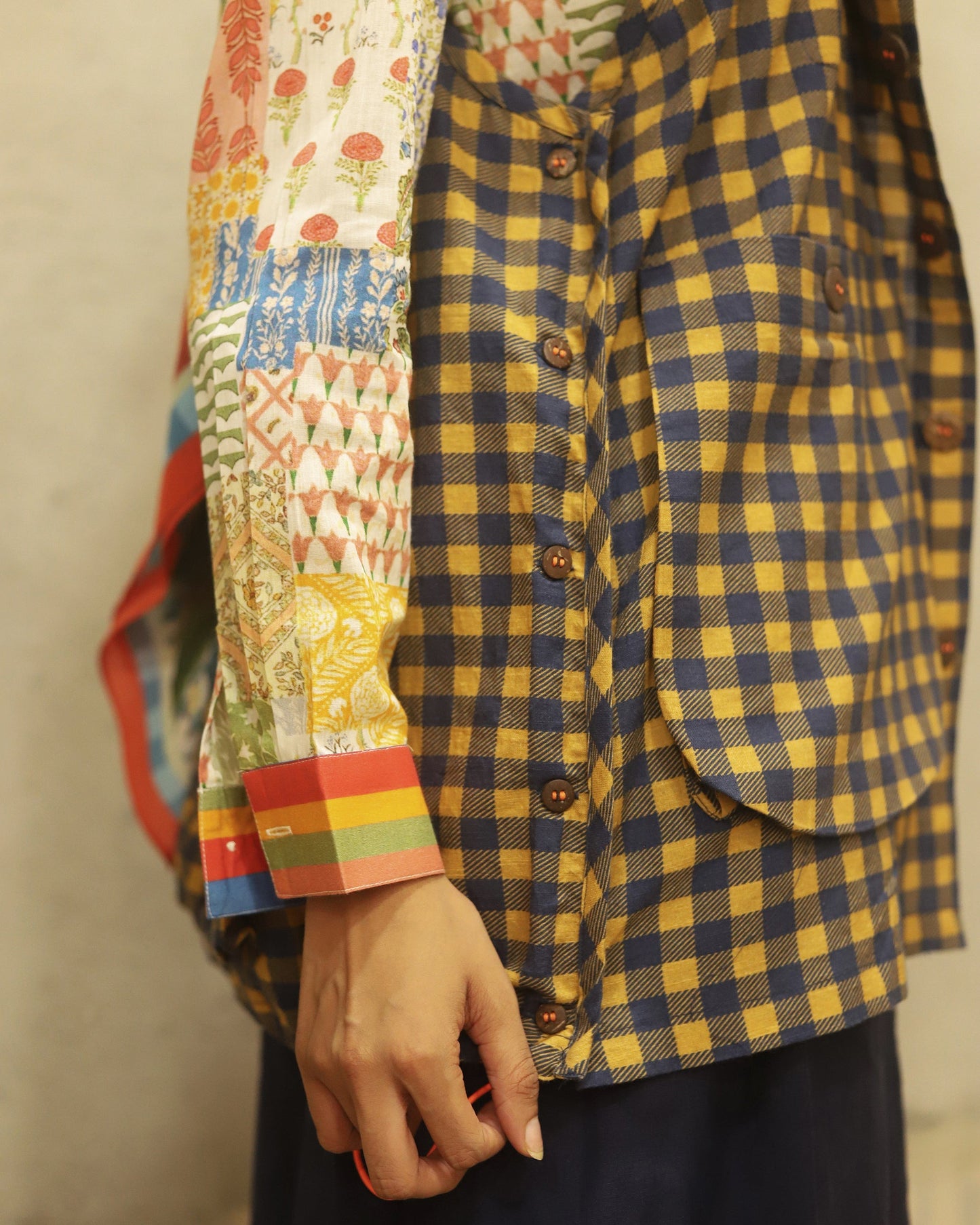 Printed cotton shirt with stripe detailing on collar and cuff + cotton jacket with oversized pockets and detailed pocket closure + cotton linen skirt in solid colour