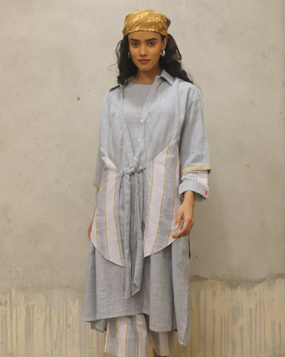Pure Cotton woven soft luxurious hand feel top with small hand stitched embroidery detailing , contrast stitch detailing on buttons on turn back sleeve fold
