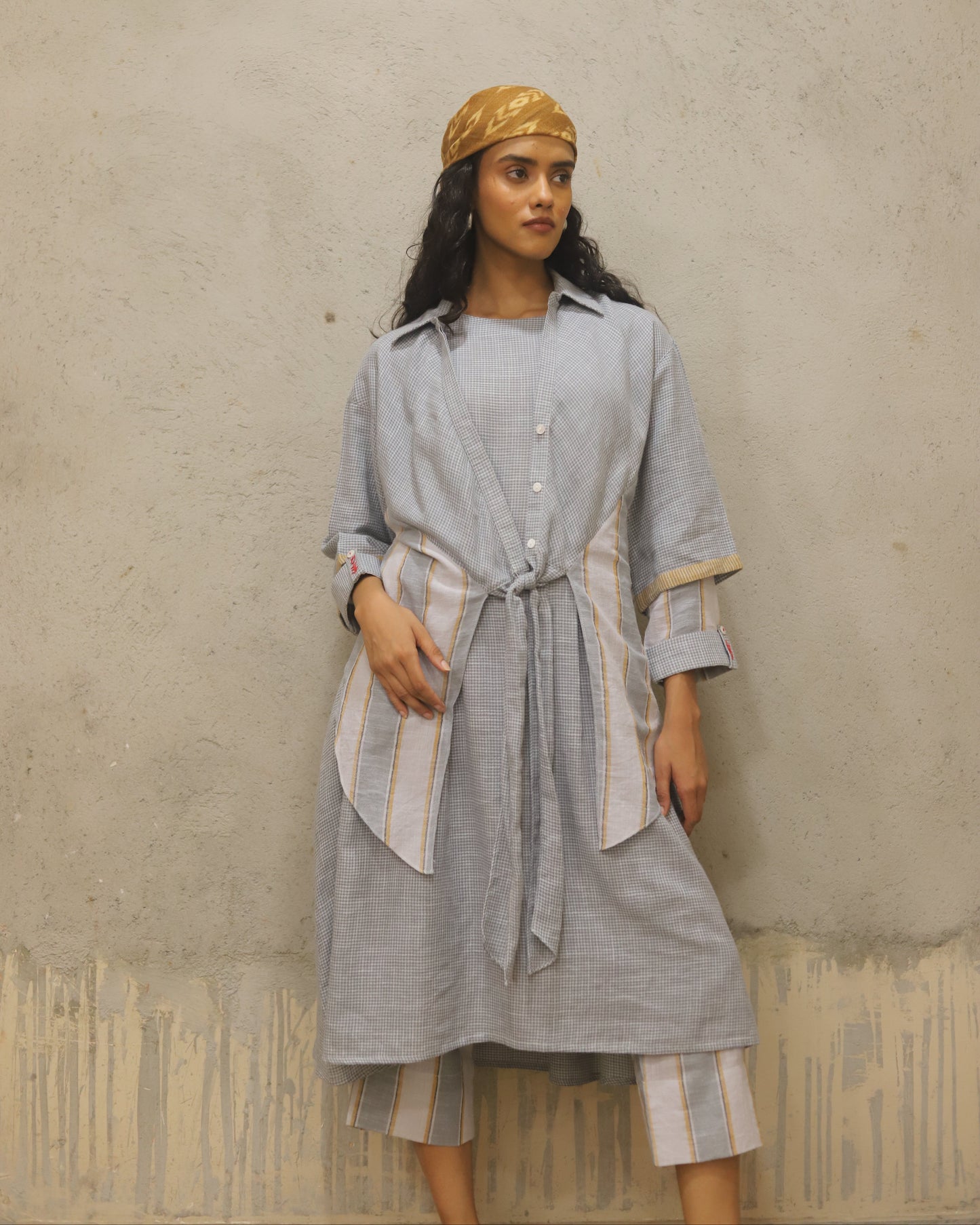 Pure Cotton woven soft luxurious hand feel top with small hand stitched embroidery detailing , contrast stitch detailing on buttons on turn back sleeve fold