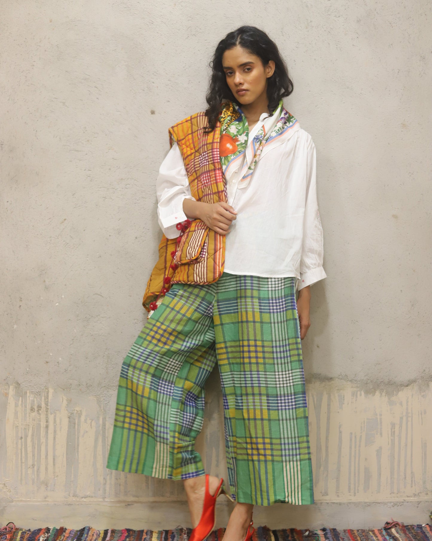 Cotton shirt with hand embroidered sleeve detail + printed check quilted reversible jacket + contrast check printed pants + matching bandana in cotton