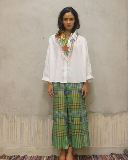 Cotton shirt with hand embroidered sleeve detail + printed check quilted reversible jacket + contrast check printed pants + matching bandana in cotton