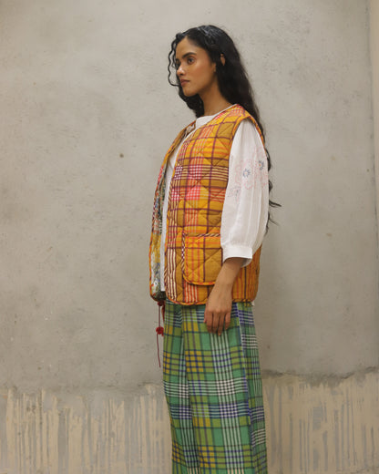 Padded Reversible jacket with check on one side and print on the other , worn both ways