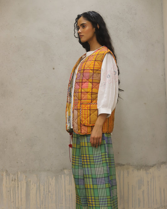 Padded Reversible jacket with check on one side and print on the other , worn both ways