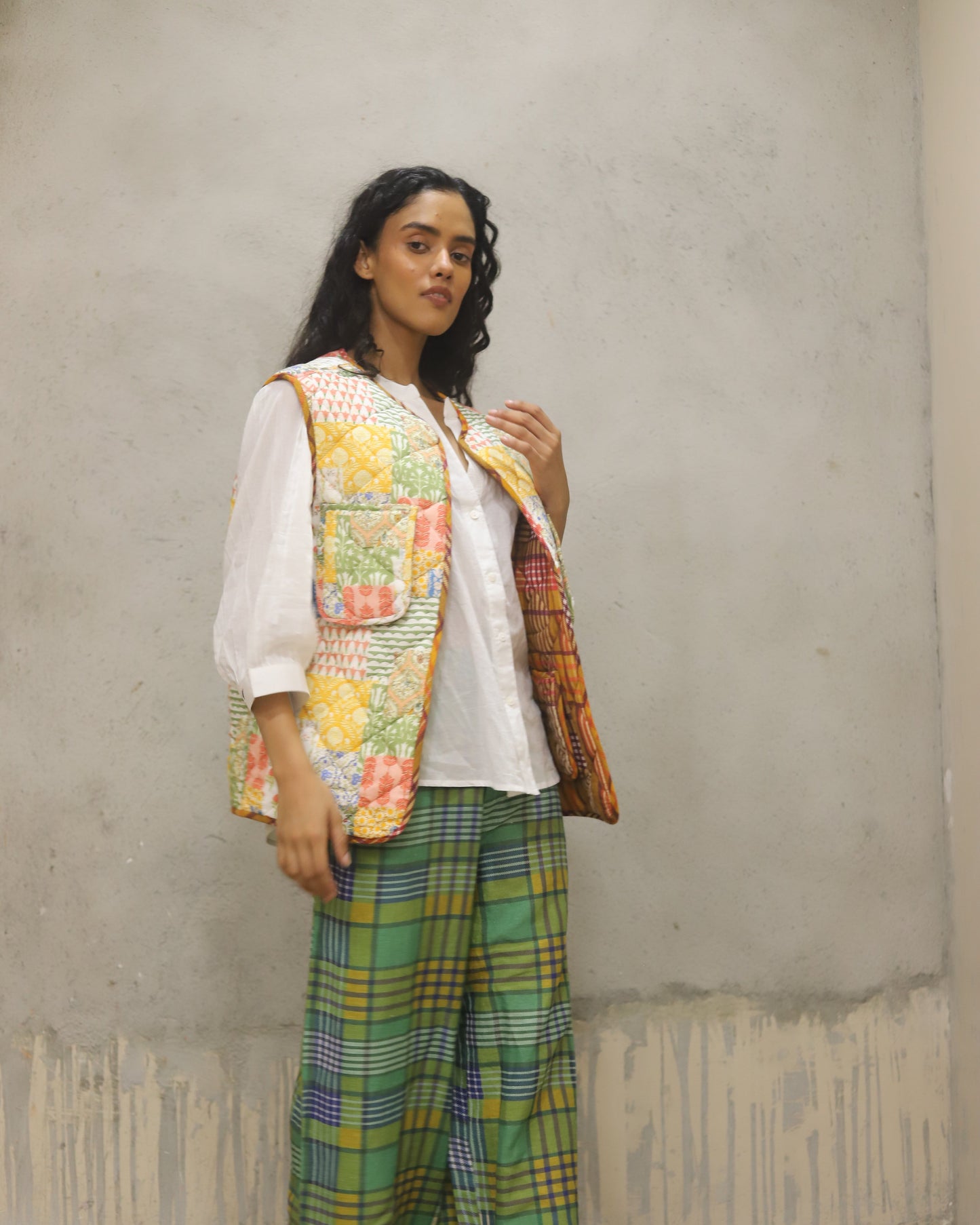 Padded Reversible jacket with check on one side and print on the other , worn both ways
