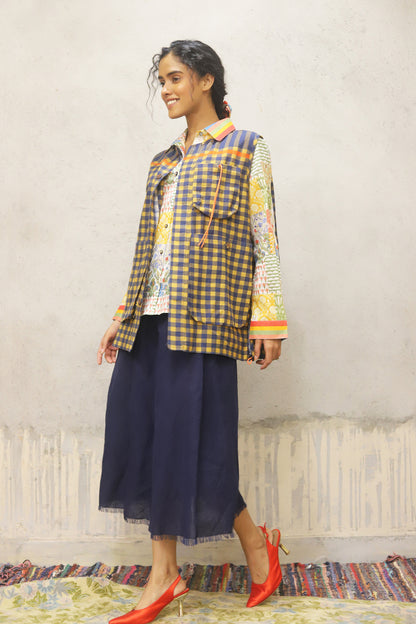 Printed cotton shirt with stripe detailing on collar and cuff + cotton jacket with oversized pockets and detailed pocket closure + cotton linen skirt in solid colour