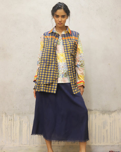 Printed cotton shirt with stripe detailing on collar and cuff + cotton jacket with oversized pockets and detailed pocket closure + cotton linen skirt in solid colour