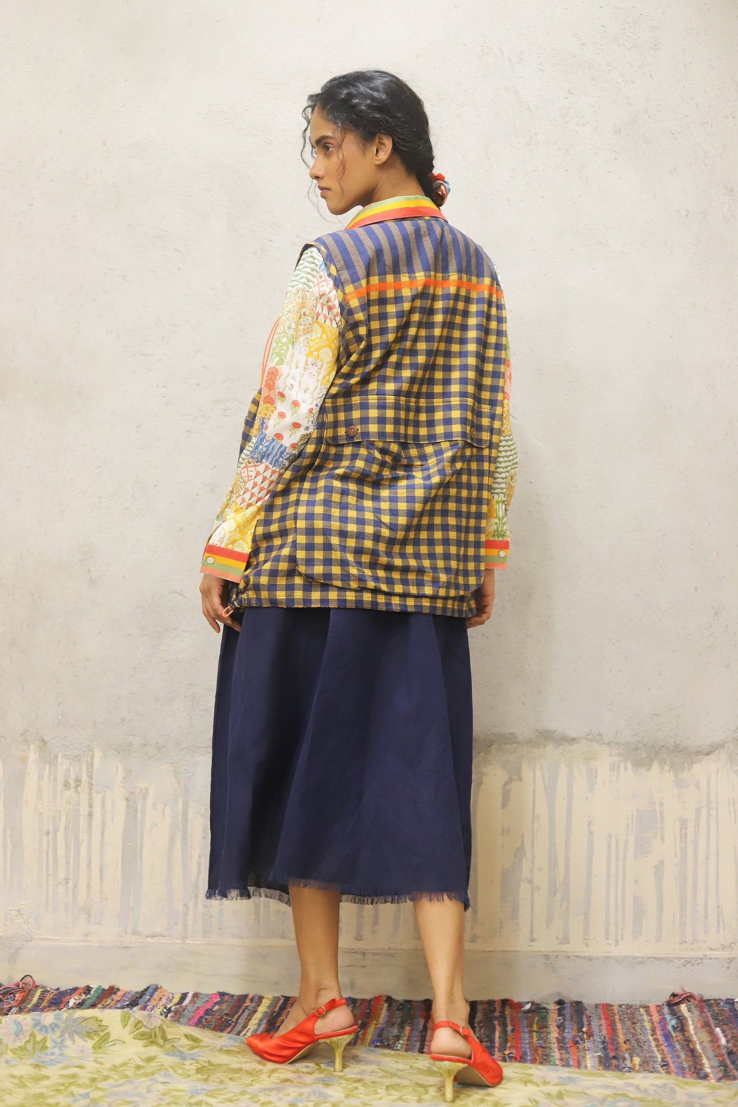 Printed cotton shirt with stripe detailing on collar and cuff + cotton jacket with oversized pockets and detailed pocket closure + cotton linen skirt in solid colour