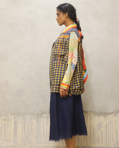 Printed cotton shirt with stripe detailing on collar and cuff + cotton jacket with oversized pockets and detailed pocket closure + cotton linen skirt in solid colour