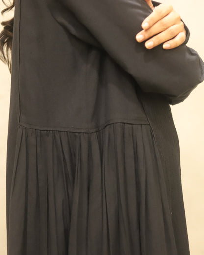 Pure cotton thick herringbone dress with heavy Pintuck detailing in the front and contrast mother of pearl buttons