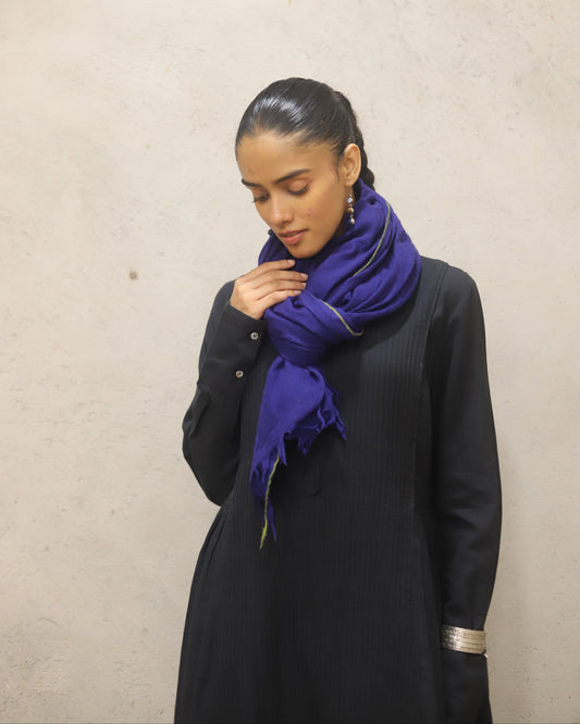 Pure merino wool woven scarf with contrast detailing at the edges