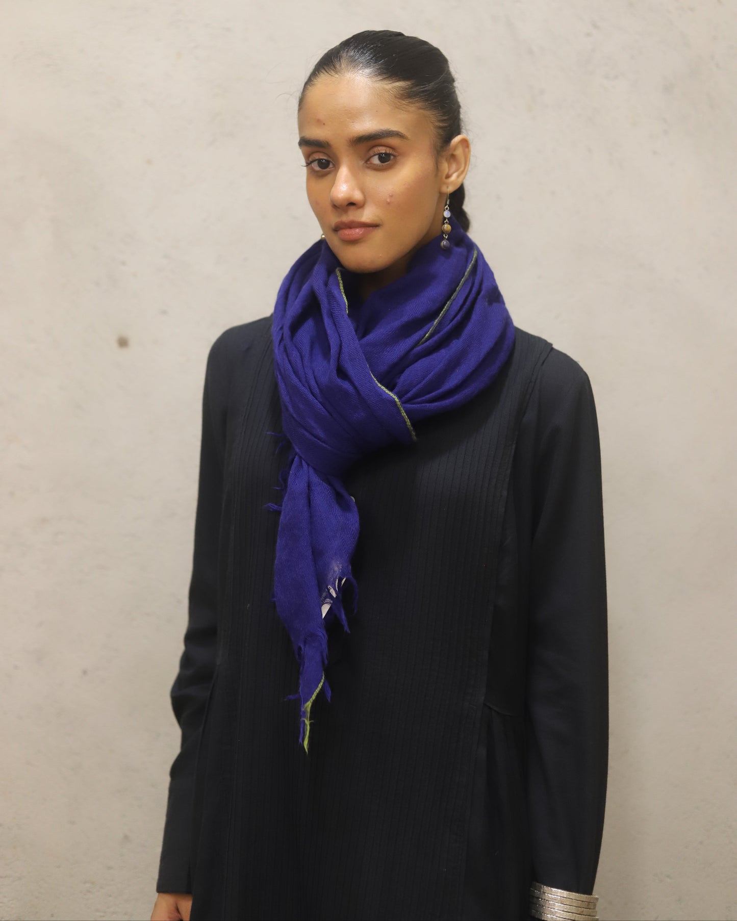 Pure merino wool woven scarf with contrast detailing at the edges
